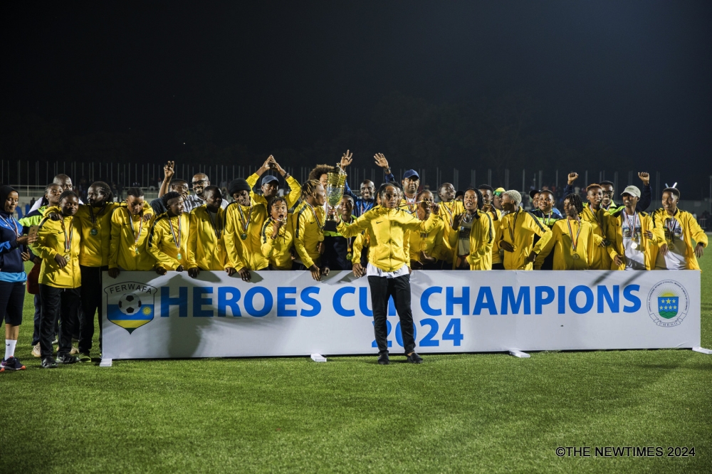 AS Kigali WFC players and staff celebrate the victory after beating Rayon Sports WFC 1-0 to win the 2024 Heroes Cup trophy at Kigali Pele Stadium on Thursday, February 1. Photo by Craish BAHIZI