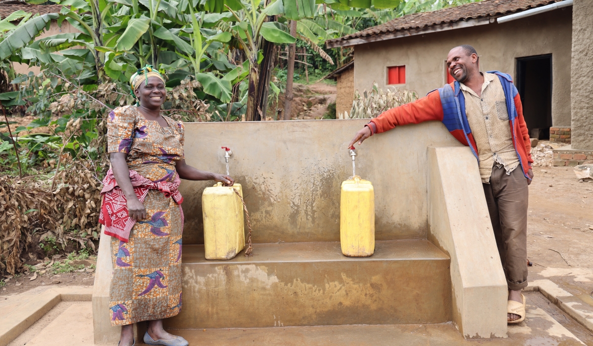 Immaculee - and her neighbors can now enjoy fetching clean water on a public water tap installed just metres from her home in Karongi, western Rwanda