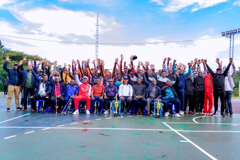 Champions Rwamagana (men) and Musanze (women) are joined by officials for a group photo-courtesy