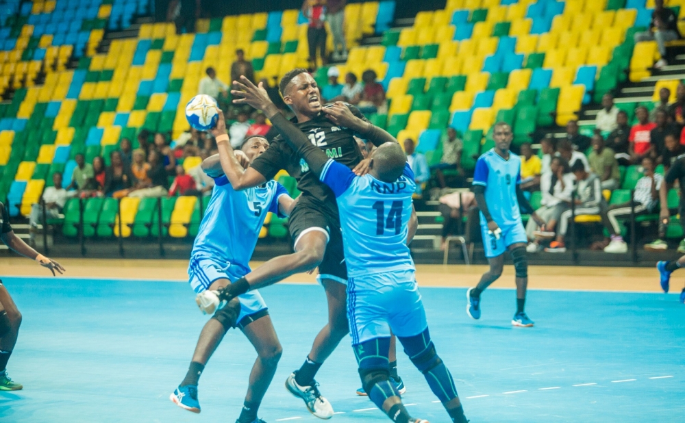 Police Handball team players vie for the ball with APR handball club during a past game. File