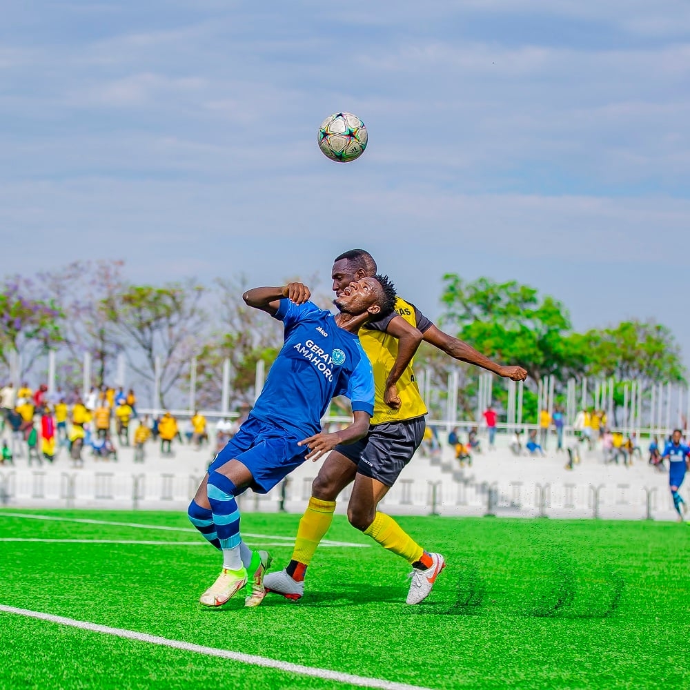 Police FC Nigerian midfielder Djibrine Akuki Abubakar (in Blue jersey) battles for the ball against Mukura&#039;s player. Akuki is sure his country will defeat South Africa in the AFCON 2023 semi finals. Courtesy