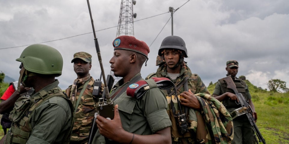 M23 rebels look on in Kibumba in Eastern Dr Congo on December 23, 2022.