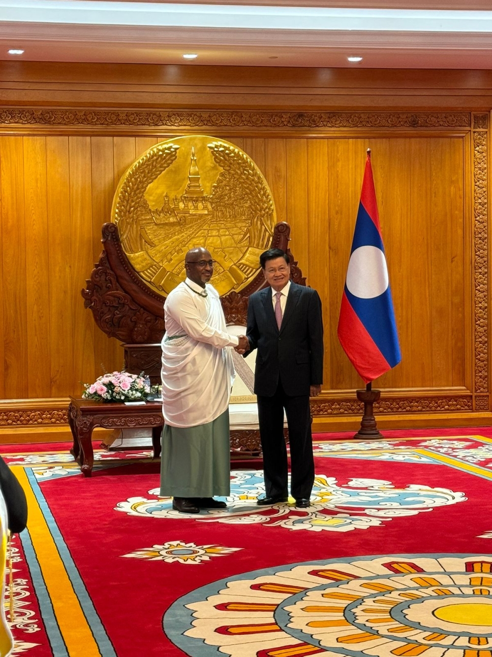 Amb Nkubiko Bakuramutsa presenting credentials to the President of Laos