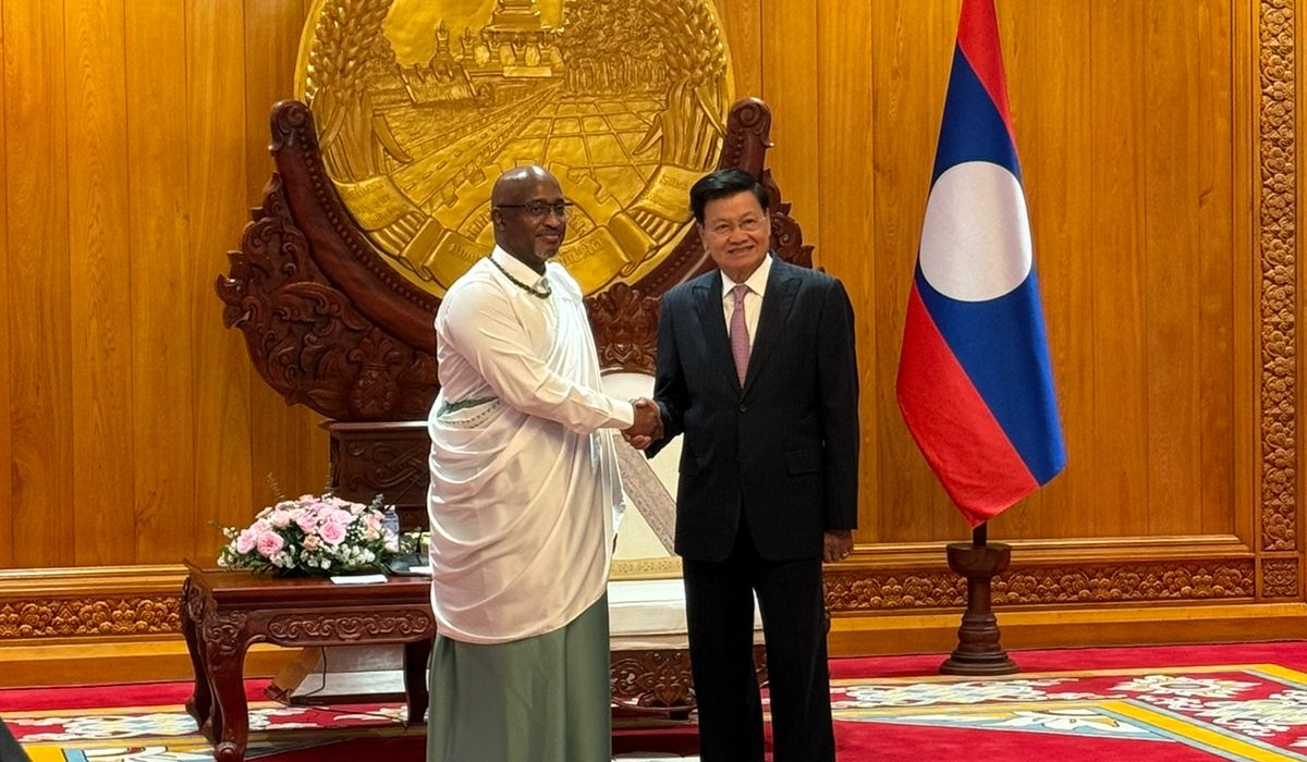 Amb Nkubiko Bakuramutsa presenting credentials to the President of Laos