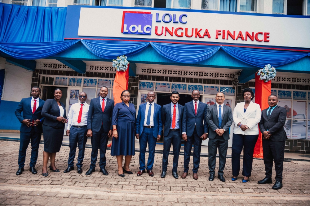 Officials pose for a photo at the event to announce the transition. This evolution is underscored by LOLC Group&#039;s acquisition of a substantial 90% shareholding.