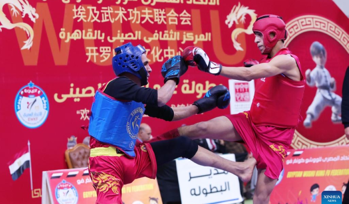 Egyptian athletes compete during the opening of the Chinese Spring Festival Wushu Championship in Cairo, Egypt, on Feb. 11, 2024. (Xinhua/Ahmed Gomaa)
