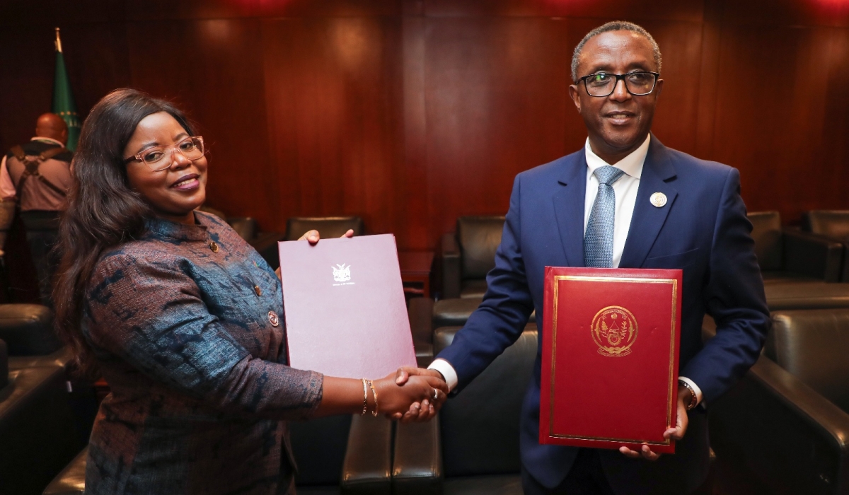 Jenelly Matundu, Namibia’s Deputy Minister of International Relations and Cooperation and Vincent Biruta, Minister of Foreign Affairs and International Cooperation during the signing of a general cooperation agreement on February 16. Courtesy
