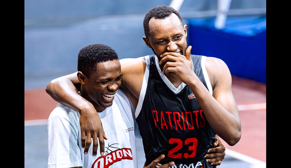 Steven Hagumintwari(R) was all smiles after inspiring Patriots to an 86-64 victory over Orion-Photos by Christianne Murengerantwari 
