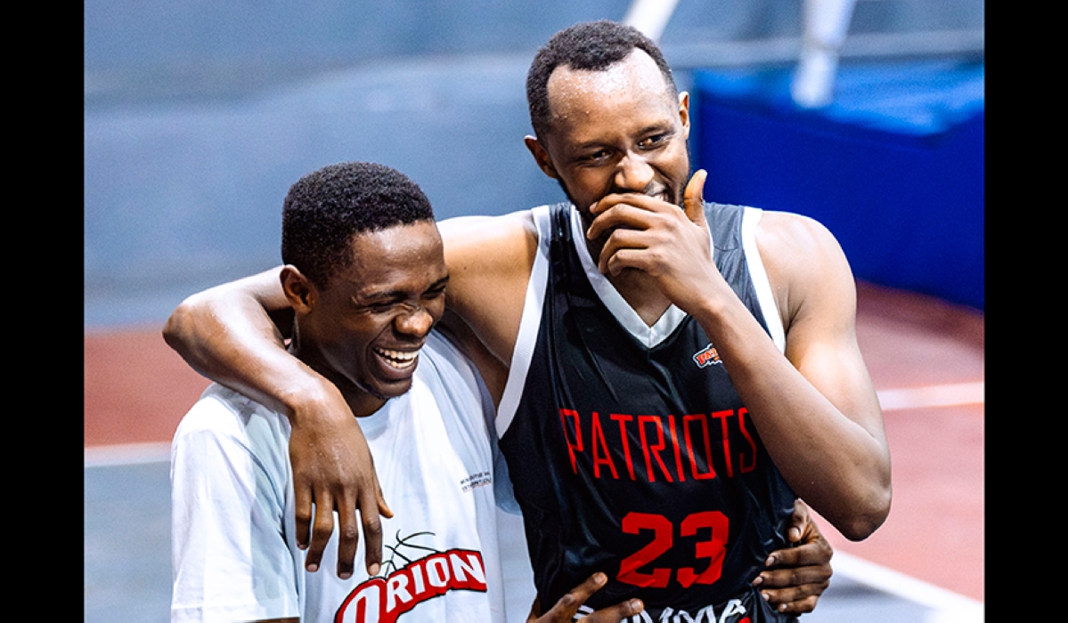 Steven Hagumintwari(R) was all smiles after inspiring Patriots to an 86-64 victory over Orion-Photos by Christianne Murengerantwari 