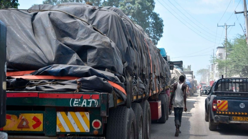Cargo trucks from Tanzania ferrying tons of maize await offloading outside the Mombasa Maize Millers Factory in Kenya. PHOTO  KEVIN ODIT  NMG
