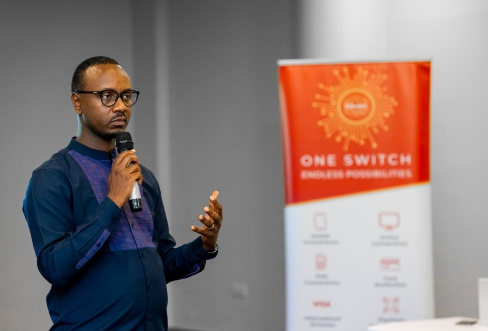 Jean-Jacques Sereme Kajuga, Chief Operating Officer of RSwitch, speaking to fintech industry players about RNDPS eKash on February 16. Courtesy photo
