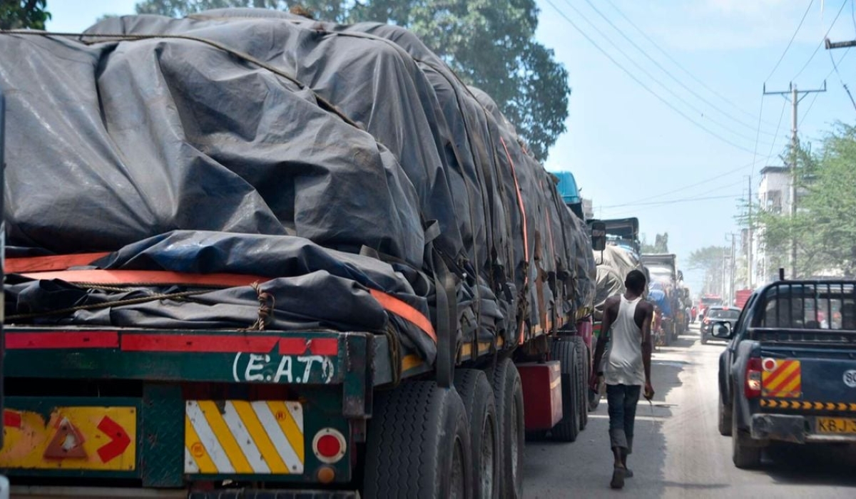 Cargo trucks from Tanzania ferrying tons of maize await offloading outside the Mombasa Maize Millers Factory in Kenya. PHOTO  KEVIN ODIT  NMG