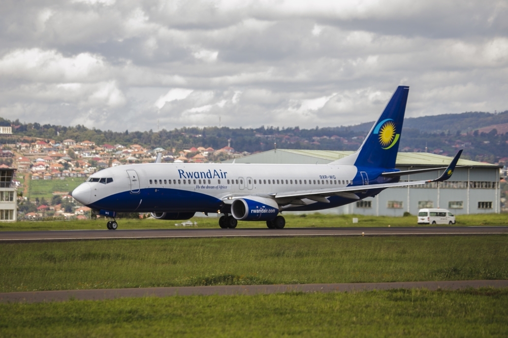 A RwandAir plane at Kigali International Airport. Rwanda is stepping up its preparedness to respond to epidemics through approaches including testing waste water from passenger airlines for early disease detection purposes. File photo.