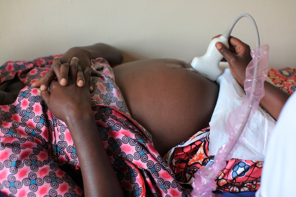 A nurse at Mayange Health Center in Rwanda uses ultrasound to assess foetal age. According to the Ministry of Health, over 200 foreigners have applied to serve and train general practitioners into gynaecologists. Net photo
