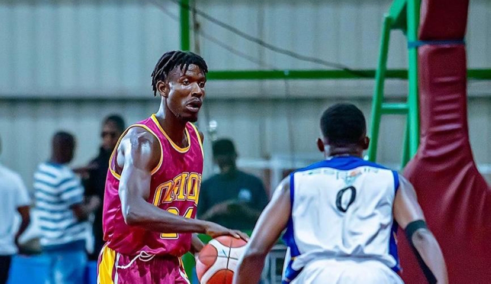Espoir star guard Olivier Turatsinze(R)tries to defend an Orion opponent during his side’s 90-74 victory over Orion at STECOL court on Friday night, February 23-courtesy 
