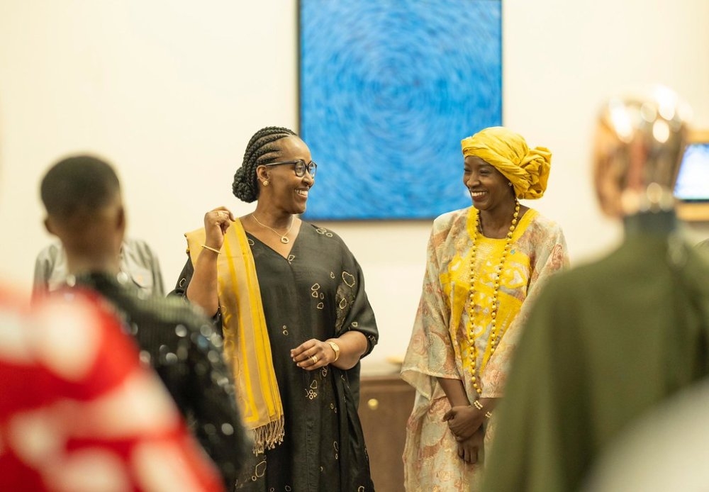 First Lady Jeannette Kagame talks to Coumba Sow, the Country Representative of the Food and Agriculture Organization of the United Nations (FAO), Rwanda.