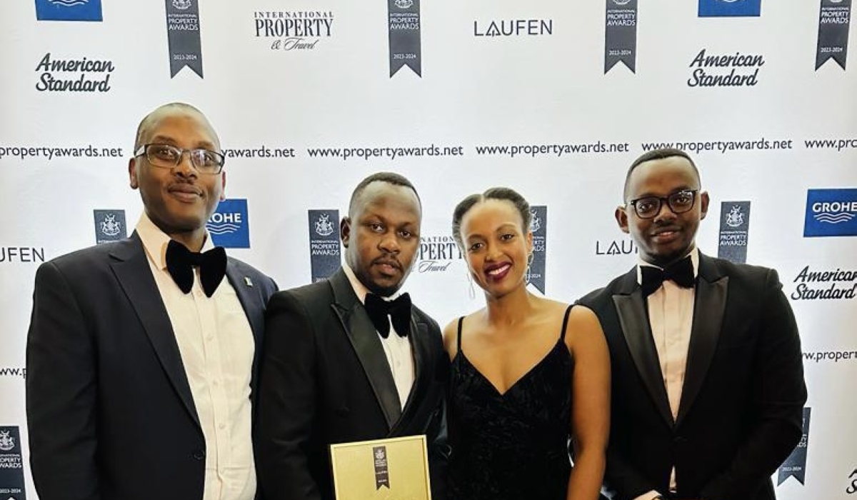 L-R: Moses Katusime, General Counsel and Secretary; Richard Kabano, Sales Manager; Paola Musoni, Head of Real Estate at RSSB; and Alain Tuyishime, Marketing and Communications Manager at UDL, display the award in London, UK.