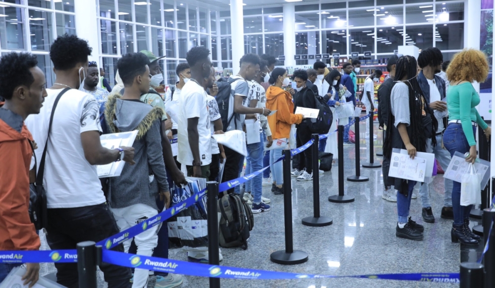 Some of the 103 refugees and asylum seekers from Libya at Kigali International Airport in August last year. Government, on February 26, announced the establishment of a special court to address cases and legal matters concerning refugees and asylum seekers. Photo Courtesy