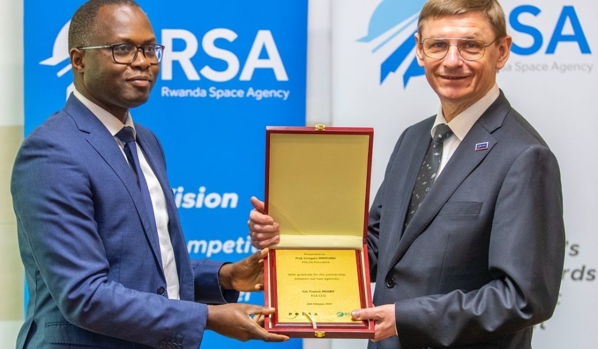 Col Francis Ngabo, CEO of Rwanda Space Agency (RSA) and Grzegorz Wrochna, President of POLSA at the signing of MoU that seeks to advance and explore bilateral collaboration opportunities in space technology. COURTESY PHOTO