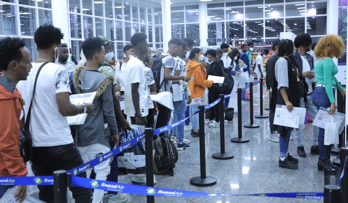 Some of the 103 refugees and asylum seekers from Libya at Kigali International Airport in August last year. Government, on February 26, announced the establishment of a special court to address cases and legal matters concerning refugees and asylum seekers. Photo Courtesy