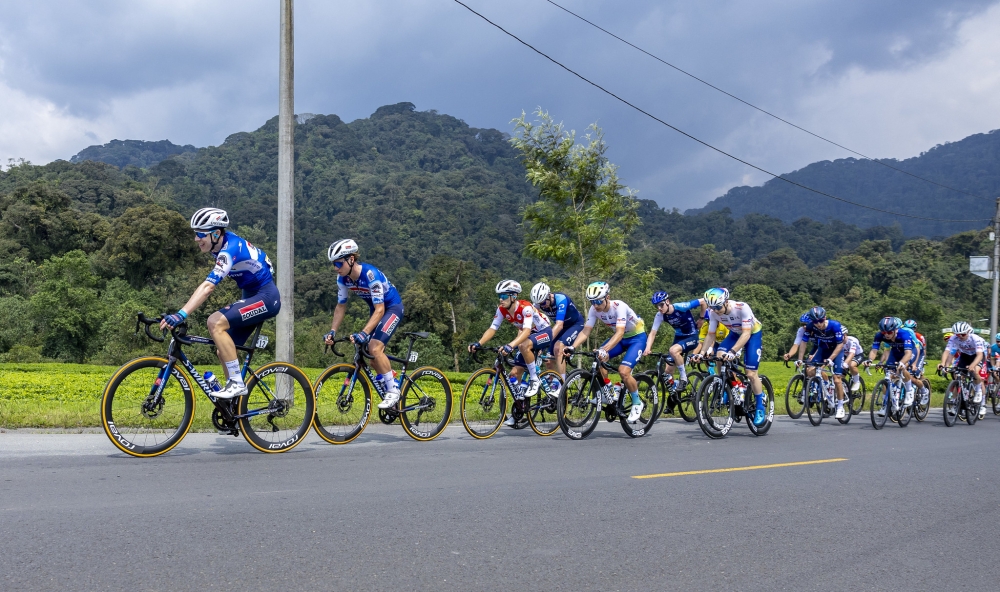 Tour du Rwanda 2024 cyclists ride in peloton at Gisakura in Nyamasheke.This year&#039;s Tour du Rwanda race attracted 94 riders from 19 teams, creating a diverse and competitive field. Photo by Olivier Mugwiza