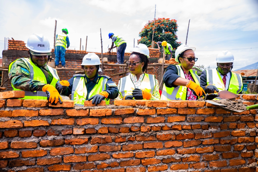In Nyarubuye Cell, Kagogo Sector, Burera District, the Deputy Inspector General of Police (DIGP) in charge of Administration and Personnel (DCG) Jeanne Chantal Ujeneza laid a foundation stone for the construction of an early childhood development (ECD) centre and handed over a cheque of Rwf5 million to support a local cooperative of agents of change composed of rehabilitated drug addicts. All photos courtesy of RNP.