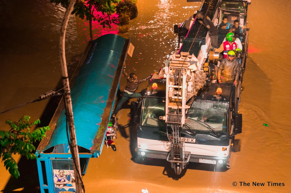 Rwanda National Police Fire and Rescue Brigade during the rescue activities of people  stranded at an overflooded highway in Kigali on February 2, 2020. File