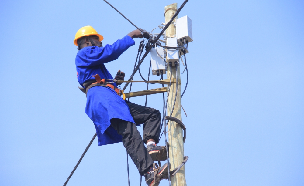 Rwanda Energy Group technician during electrical  installation. The Minister of Infrastructure, Jimmy Gasore, is set to appear in Parliament on Tuesday afternoon to respond to issues related to Rwanda’s electricity production.