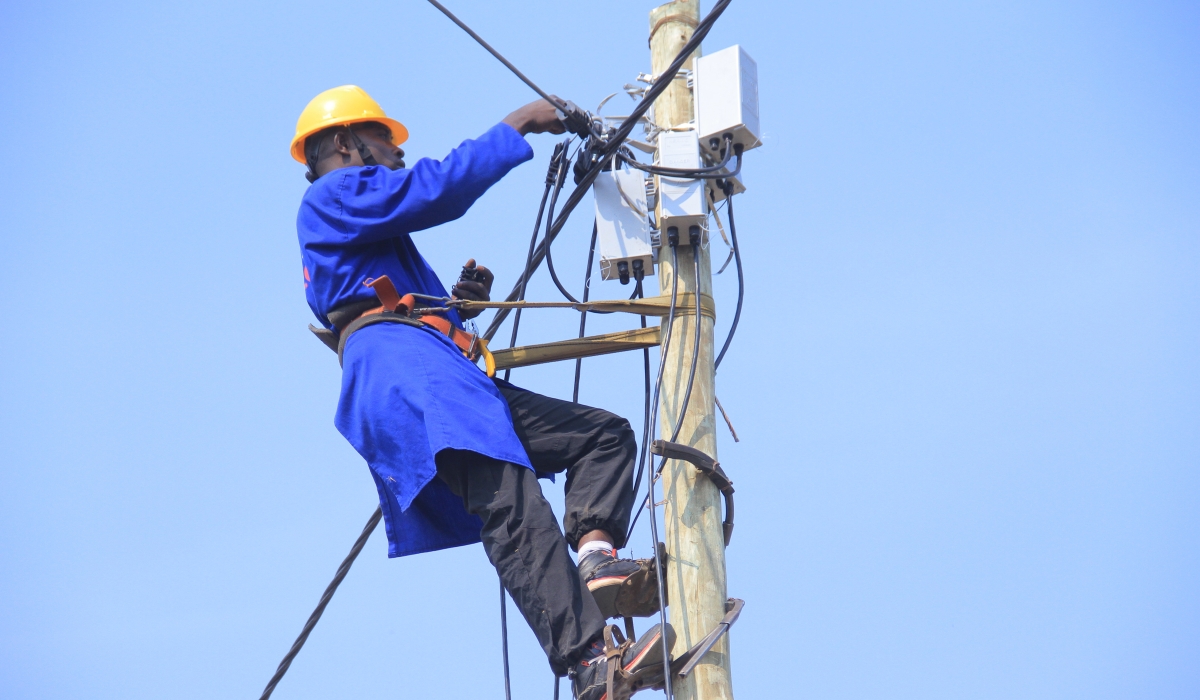 Rwanda Energy Group technician during electrical  installation. The Minister of Infrastructure, Jimmy Gasore, is set to appear in Parliament on Tuesday afternoon to respond to issues related to Rwanda’s electricity production.