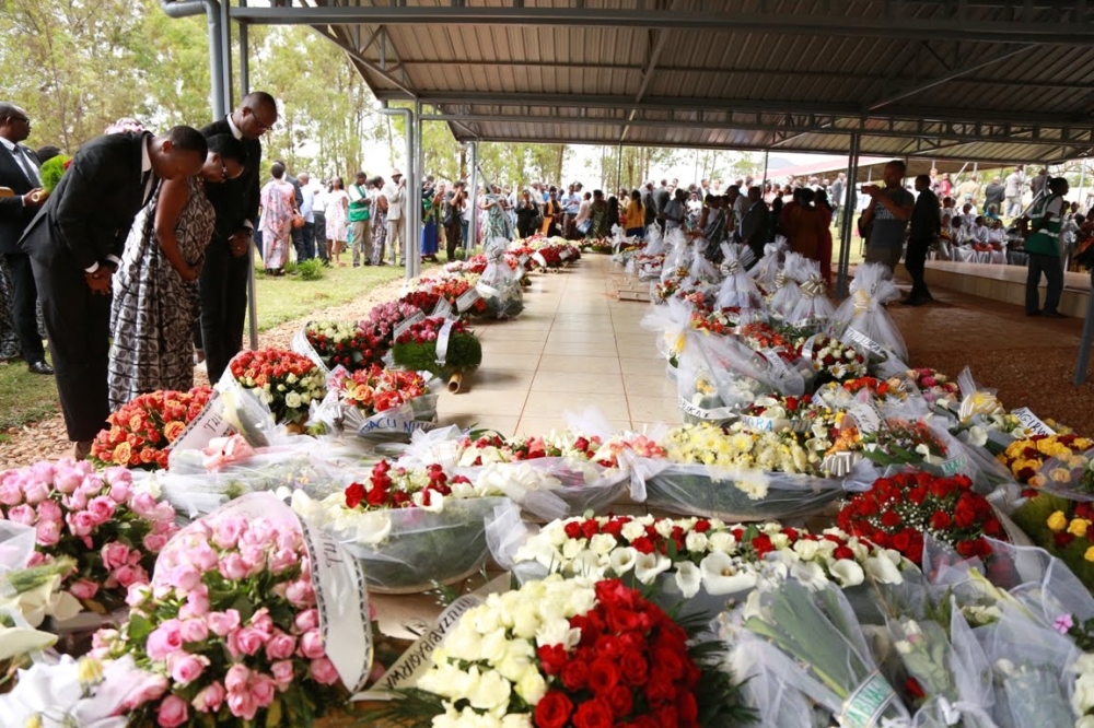 Family members of the victims pay respect to the victims of the Genocide against the Tutsi at Kicukiro Nyanza Genocide Memorial. Photo by Sam Ngendahimana