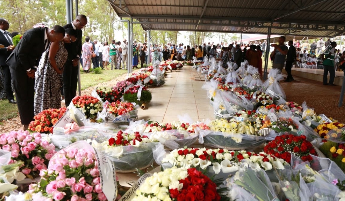 Family members of the victims pay respect to the victims of the Genocide against the Tutsi at Kicukiro Nyanza Genocide Memorial. Photo by Sam Ngendahimana