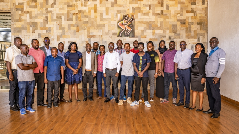 Trainers and trainees pose for a group photo during a training session in Musanze. Photo by Emmanuel Dushimimana