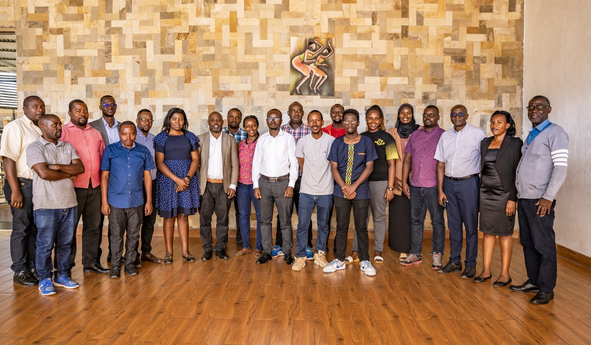Trainers and trainees pose for a group photo during a training session in Musanze. Photo by Emmanuel Dushimimana