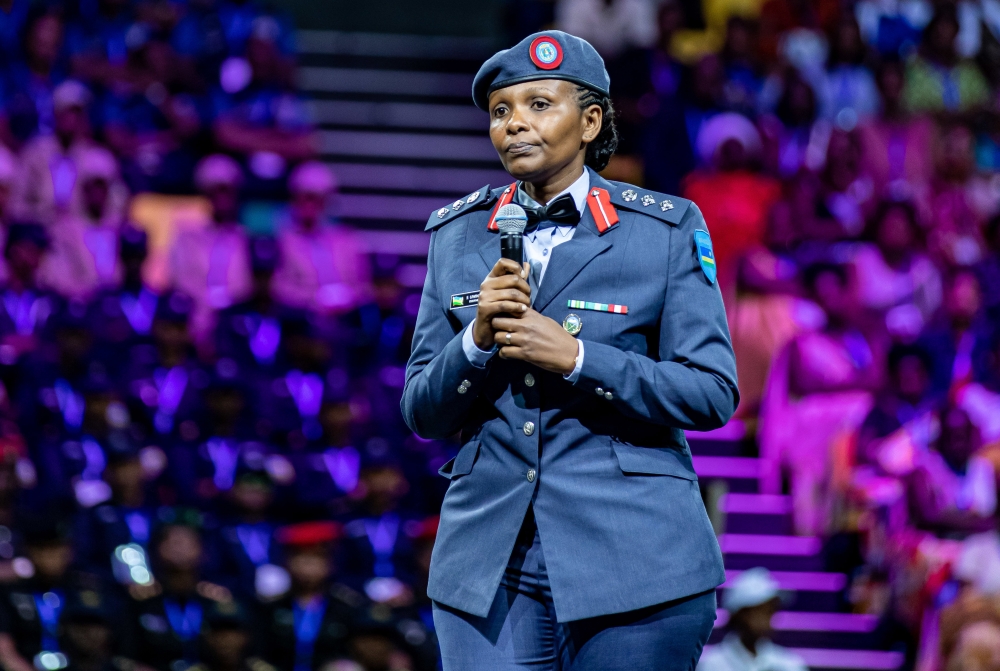 Col Stella Uwineza gives a testimony on her military journey to thousands of participants, during the celebration of International Women’s Day, on March 8. Photos by Dan Gatsinzi