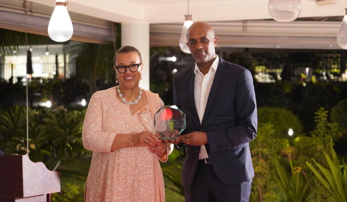Commonwealth Secretary-General, Patricia Scotland KC hands over the award to Justice Mminister Emmanuel Ugirashebuja  during the 2024 Commonwealth Law Ministers Meeting  in Zanzibar on Wednesday, March 7. Courtesy