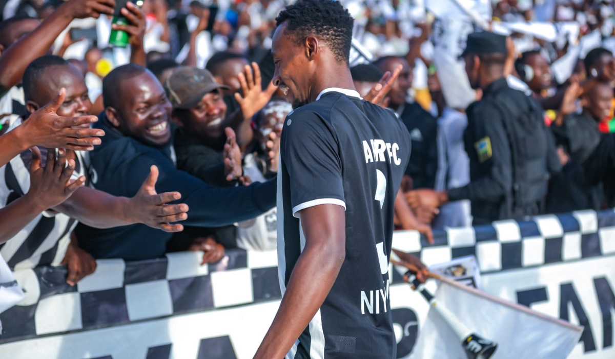APR FC supporters cheering on goal scorer as the Army side stunned archrivals Rayon Sports 2-0 at Kigali Pele Stadium on Saturday, March 9. All photos by Craish Bahizi
