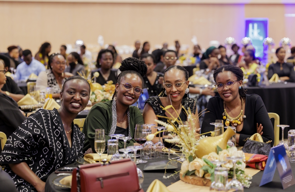 Delegates pose for a photo during the Bank of Kigali&#039;s gala dinner for celebrating the International Women&#039;s Day at Kigali Convention Centre on Friday, March 8. Courtesy