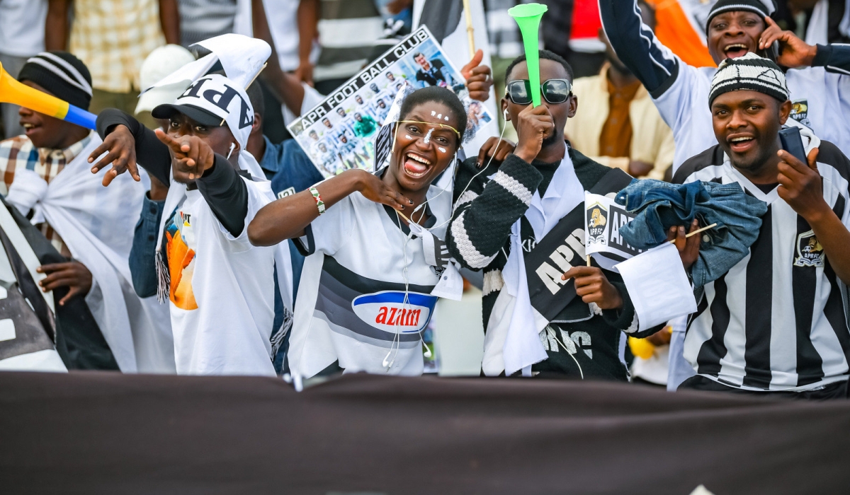 APR FC fans celebrate the 2-0 win over Rayon Sports at Kigali Pele Stadium on Saturday, March 9. Photo by Craish Bahizi