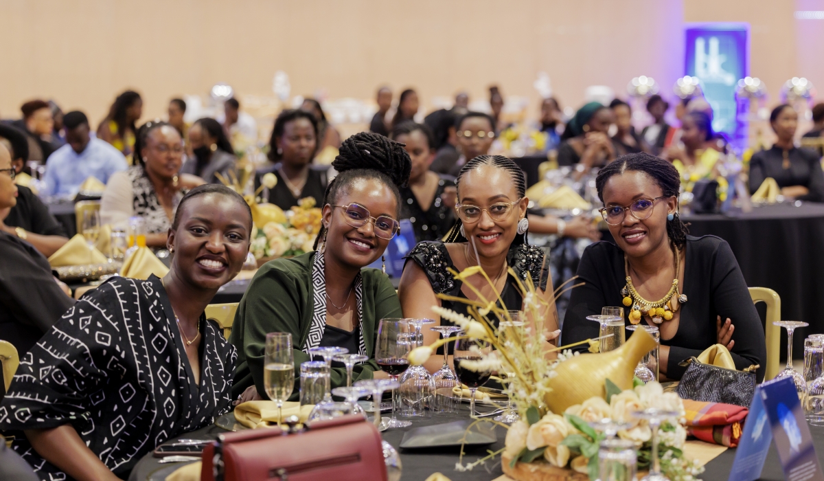 Delegates pose for a photo during the Bank of Kigali&#039;s gala dinner for celebrating the International Women&#039;s Day at Kigali Convention Centre on Friday, March 8. Courtesy