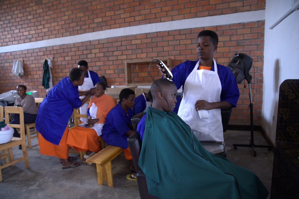 Inmates during salon, haircutting training. All photos by Emmanuel Nkangura