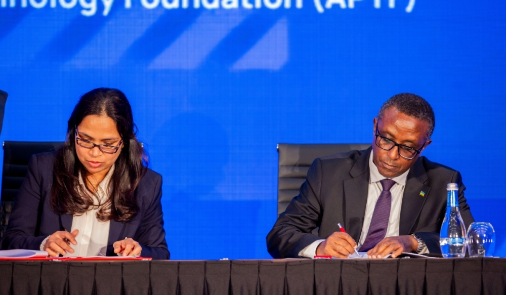 Dr Vincent Biruta, Minister of Foreign Affairs and Prof. P.G. Sampath of the Africa Pharmaceutical Technology Foundation (APTF), sign the Host Country Agreement between Rwanda and APTF in Kigali on Monday, December 18,2023.File