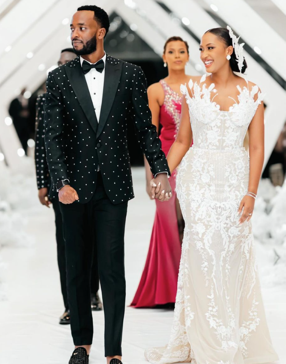 Footballer Yves Kimenyi and his wife Claudine Muyango spotted in Tanga design during their wedding ceremony Footballer Yves Kimenyi and his wife Claudine Muyango spotted in Tanga design during their wedding ceremony