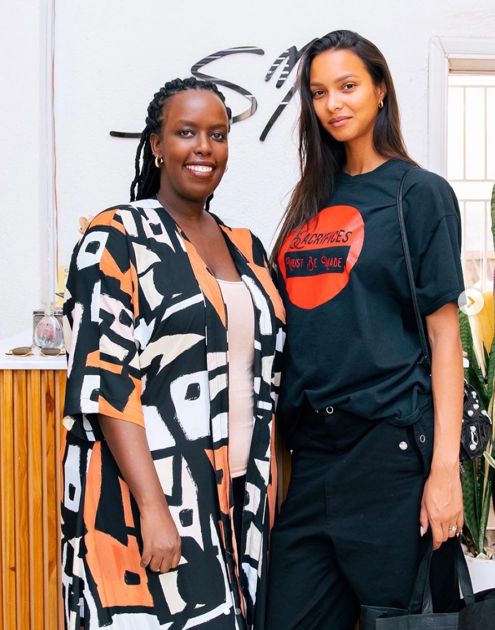 Sonia Mugabo (L), Lais Ribeiro, wife of Joakim Noah at Sonia Mugabo (SM) fashion house