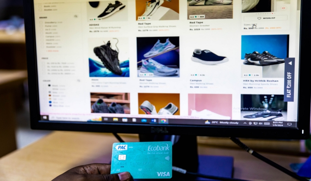 A consumer shops for shoes online. Rwanda Inspectorate, Competition and Consumer Protection Authority (RICA) stated that there is a need to build trust in the digital marketplace as Rwanda works to become a cashless economy. Photo Courtesy