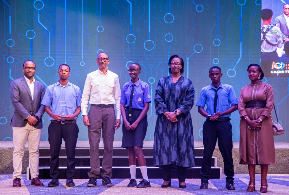President Paul Kagame and First Lady Jeannette Kagame pose for a photo with students of Ecole Secondaire de Kayonza, the winners of the AI Hackathon at Intare Conference Arena on Saturday, March 16. Photo by Craish Bahizi