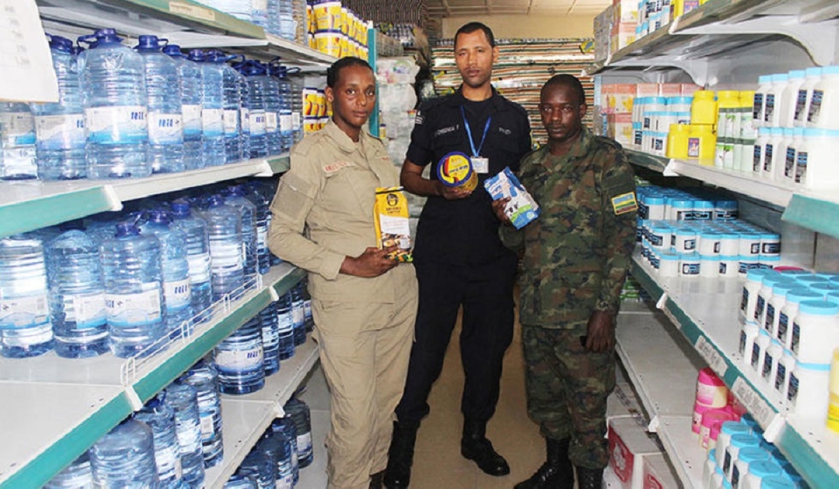 Some clients pose for a photo inside Army shop. The government is considering the possibility to include Rwanda Reserve Forces in the beneficiaries of armed forces’ shop (AFOS). Courtesy