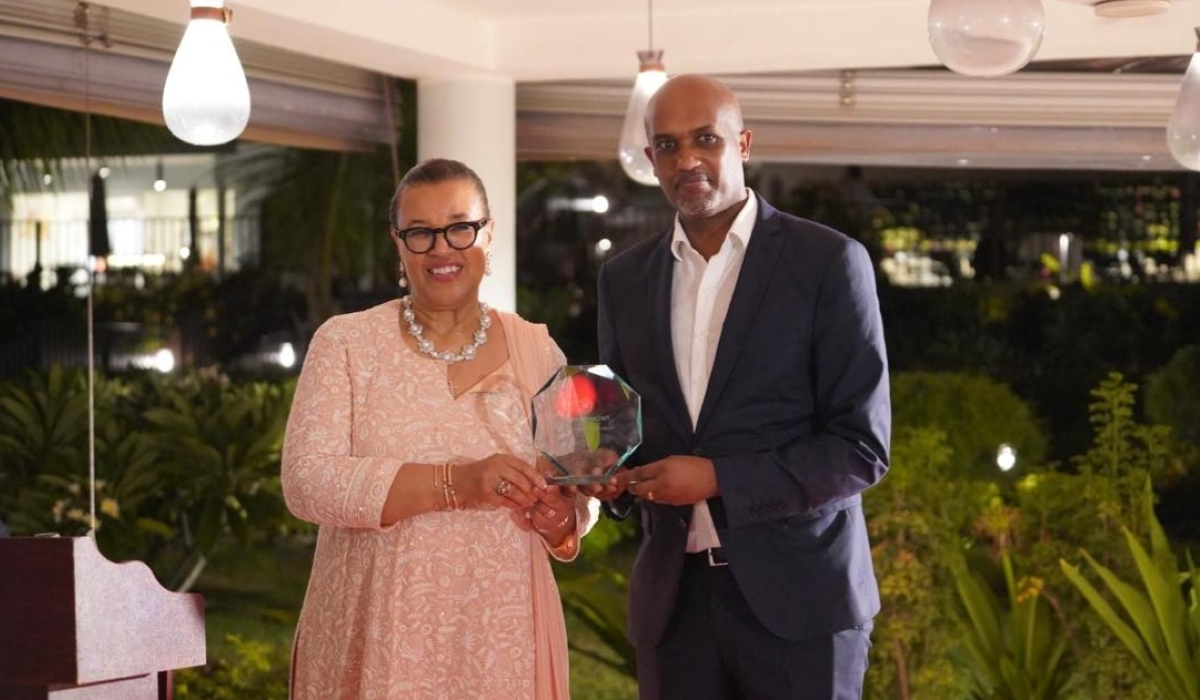 Commonwealth Secretary-General, Patricia Scotland KC hands over the award to Justice Minister Emmanuel Ugirashebuja during the 2024 Commonwealth Law Ministers Meeting in Zanzibar on Wednesday, March 7. Courtesy