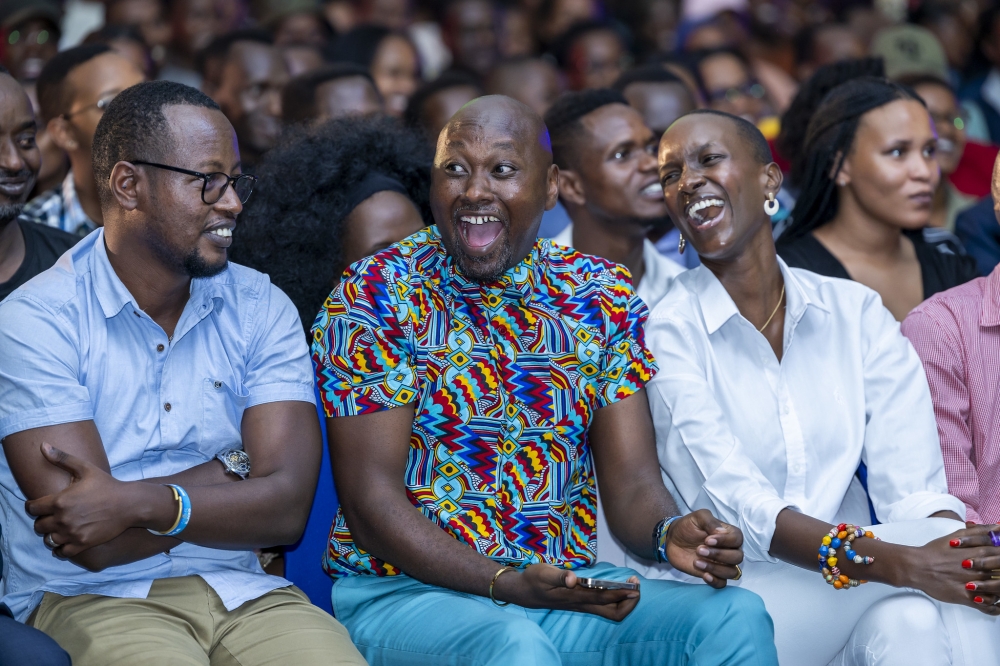 Attendees laughing during Gen Z comedy show  at the Kigali Conference and Exhibition Village on Thursday. Mugwiza