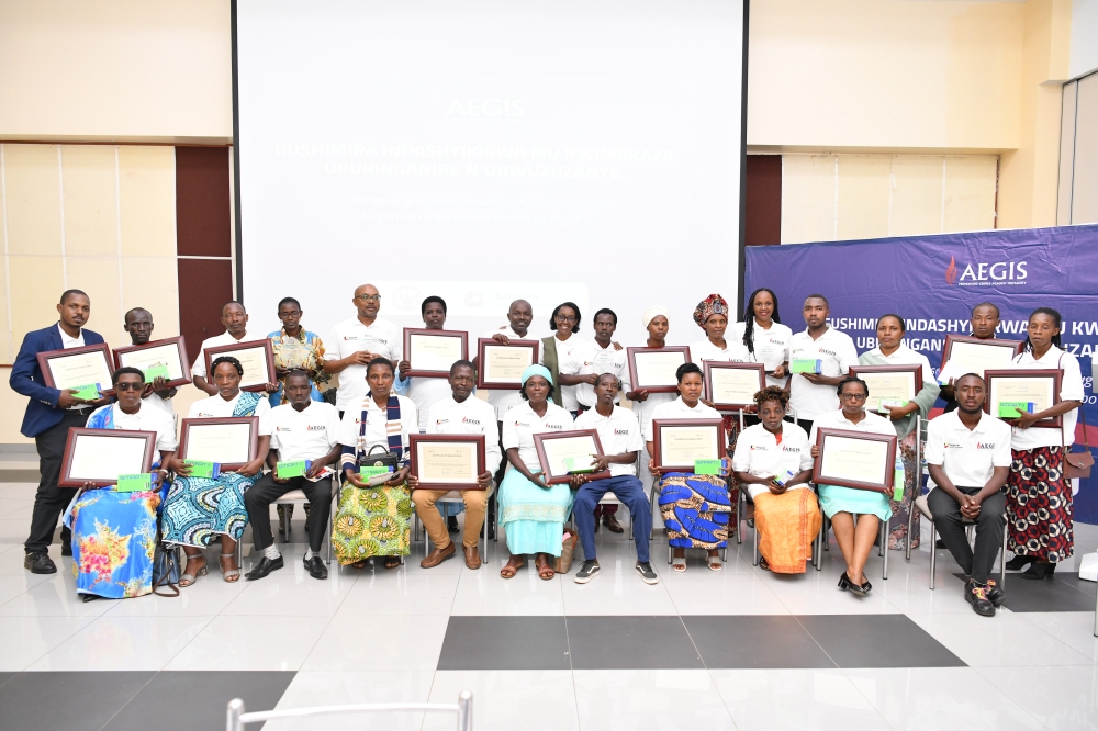 Gender champions who excelled in progress of promoting positive masculinities and fostering gender equality posing for a group photo after the rewarding ceremony in Kigali