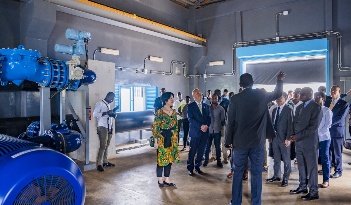 Officials tour inside of  the recently completed Nzove - Ntora principal water transmission pipeline  on Wednesday, March 20. Emmanuel Dushimimana